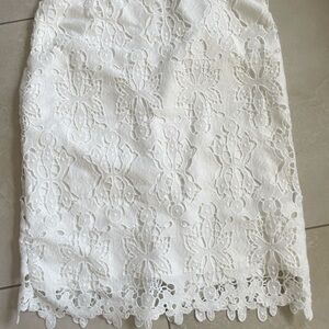 Knee length cream lace skirt